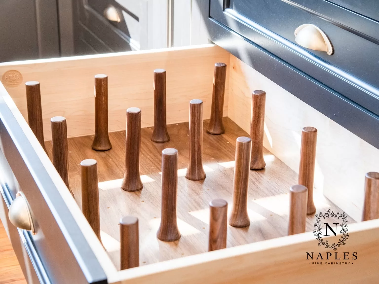 Peg organizer inside a kitchen drawer
